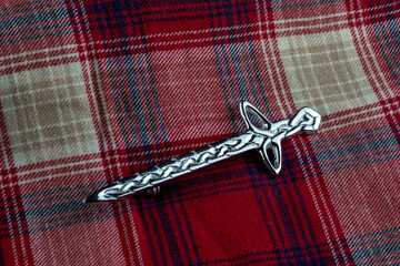 Scottish Traditional Kilt Pin on Tatran Cloth Closeup View