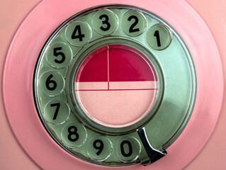 Vintage Pink Analogue Telephone Dial Closeup View