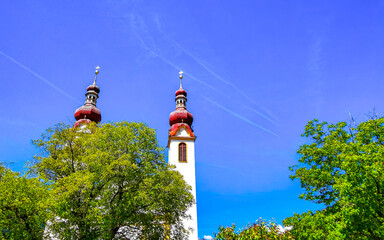 Barbara church cathedral Barbarakirche Fliess with blue sky Tyrol Austria.