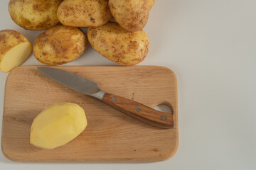 potatoes on cutting board
