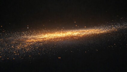 Abstract, swirling, golden particles against a dark backdrop