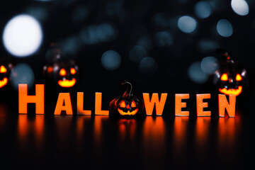 Glowing Halloween pumpkins and orange letters against a dark background, festive spooky atmosphere – holiday decoration and celebration concept.