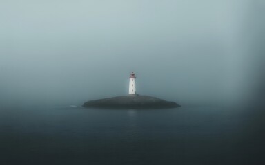 Fototapeta premium Solitary lighthouse in foggy seascape