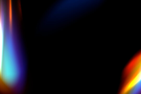 Colorful abstract glowing rainbow color light at border on dark black background with copy space in the middle