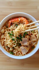 A dish with noodles, shrimp and chicken. Useful for cooking blogs, food articles and recipes.