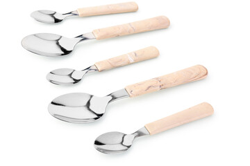 Stainless steel spoons with plastic handles on white background