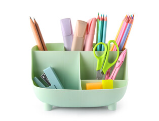 Plastic holder with different stationery on white background