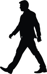 Silhouette of a man confidently walking forward in a suit