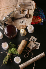 Witch's magic attributes on dark table