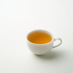 Single Cup of Golden Tea on White Background