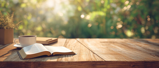 serene scene with open bible laying on the table outside, next to a coffee cup and tranquil green garden on sunny day scene; concept of bible study, calmness, searching for answers; copy space