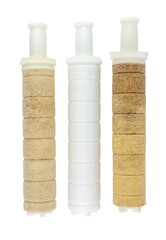 Side-by-side on a transparent background, two heavily soiled and worn water filters are positioned next to a gleaming, new white filter