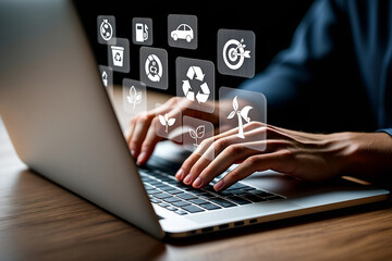 Person using laptop with sustainable energy and eco friendly icons