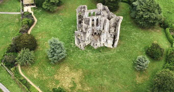 Aerial view of Old Wardour Castle and surrounding parkland, heritage site in English countryside
