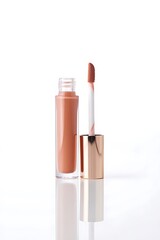 Rose gold lip gloss tube with applicator