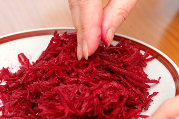 Beetroot preparation in a cozy kitchen during a sunny afternoon