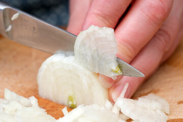 Chopping onions with precision for that perfect meal preparation