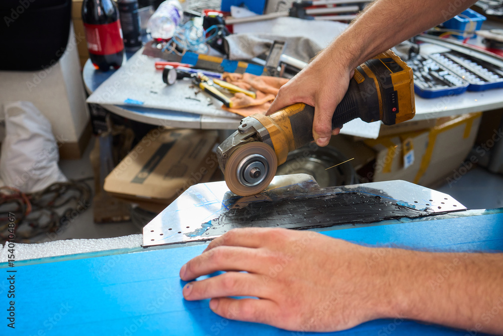 Aufkleber utilizing power tools in the workshop for various metalworking projects effectively