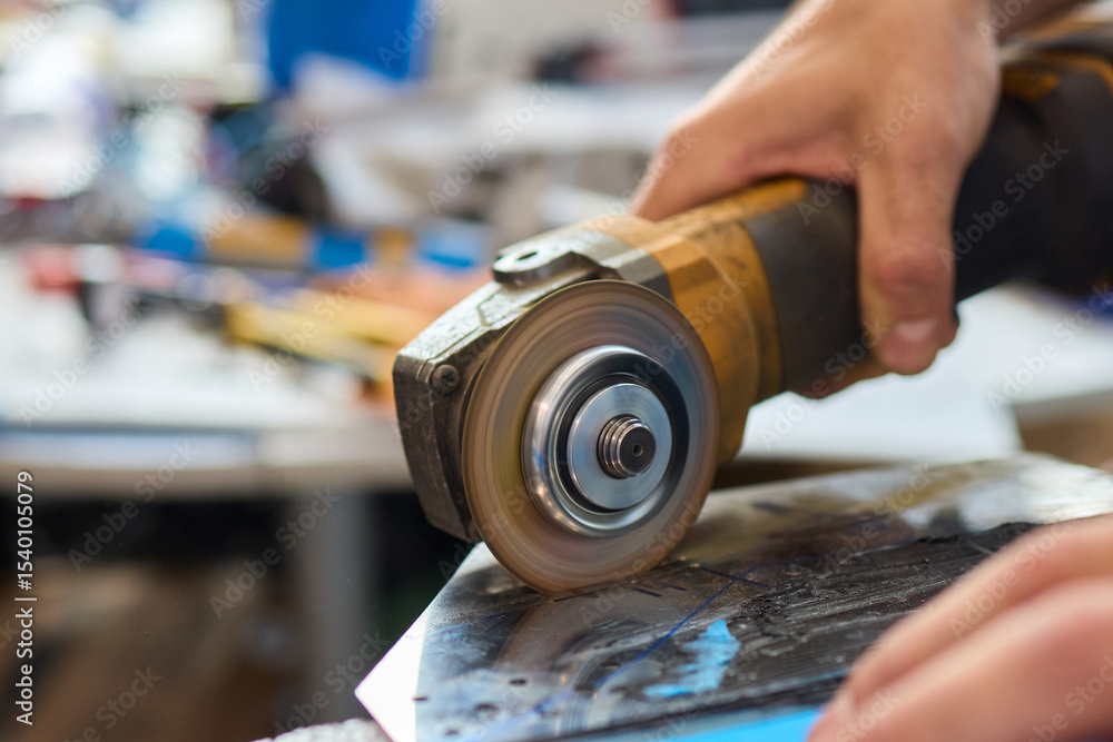 Aufkleber utilizing power tools in the workshop for various metalworking projects effectively