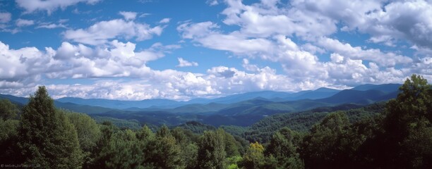 Panoramic mountain vista with thick clouds