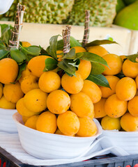 Thai ma yong chit ranges from yellow to orange and has bright purple seeds.
Slightly sweet and...