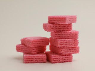 Pink strawberry wafer on white background
