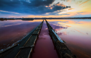 Fototapeta premium The clouds are reflected in the water. Landscape color view of Salt lake, located in Burgas, during beutifull sunset. 