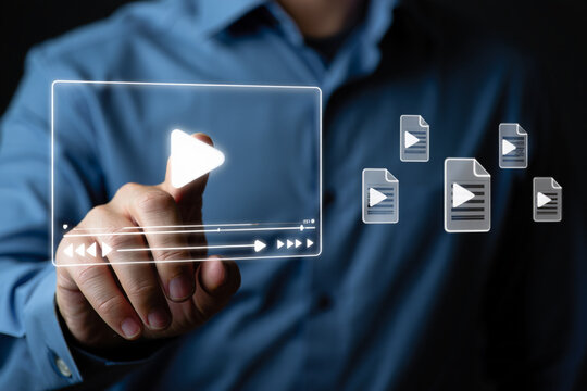 Man Interacting with Digital Video Player and Files Interface