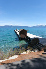 Sugar Pine Point Beach on Lake Tahoe with its beach, pine trees, and beautiful clear water.