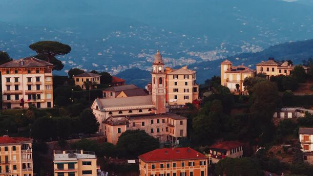 Zooming on santuario di nostra signora di montallegro church in rapallo at dusk