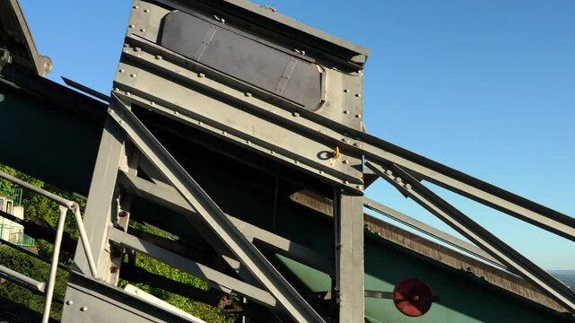 Schwebebahn Dresden travels above ground through city. Iconic suspended railway and tourist attraction in Germany with panoramic scenery. 