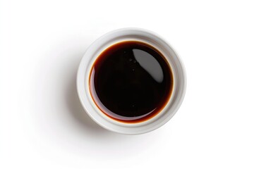 High Quality Picture of Soy Sauce in a Bowl Isolated on a White Background Top View