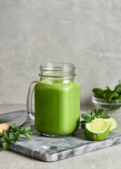 Green smoothie with lime and mint. 