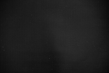 grunge overlay effect with scratch and dust on black background,retro distressed noisy grain dust texture for film or photo overlay effect on black background,old photo overlay texture