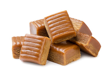 Pile of toffee candies close-up on a white. Isolated