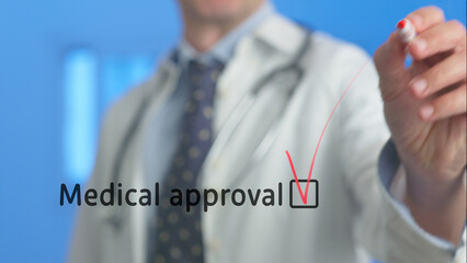 Doctor using a red marker to draw a check mark in a checkbox for medical approval, symbolizing...