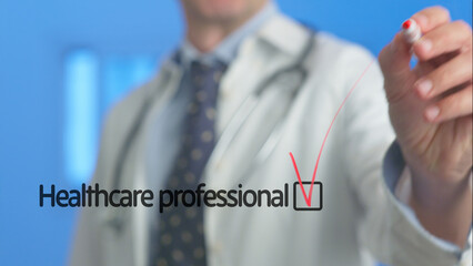 Blurred doctor wearing a lab coat and stethoscope, drawing a red check mark in a checkbox alongside the words healthcare professional, symbolizing expertise in the medical field