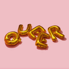letter-shaped balloons forming the word queer