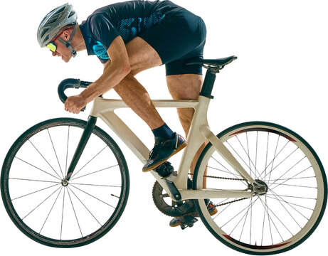 Focused male athlete leans forward on white racing bicycle, pushing intensity in sprint posture for competitive performance. Concept of speed, sport, competition, cycling, training.