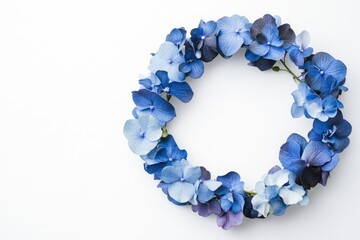 Circular floral wreath of vibrant blue hydrangeas