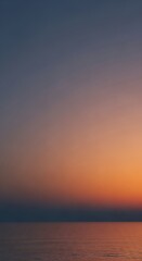Modern abstract background featuring a soft gradient transition from blue to orange.