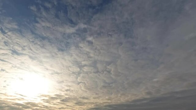 timelapse clip of overcast clouds and sun for weather forecast