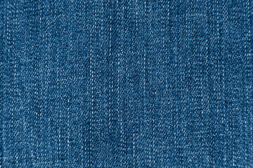 Macro texture of cotton blue denim fabric