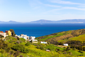 Pastoral view of the Spanish coast across the Strait of Gibraltar from the Kingdom of Morocco....
