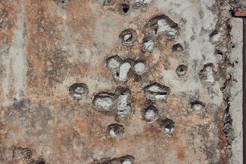 Damaged wall bullet hole after war
