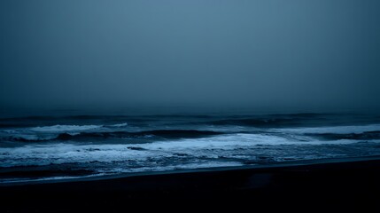 Misty beach at night