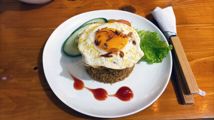fried egg with rice and vegetables