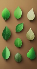 Green leaves of various shades, displayed on a tan background