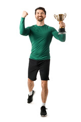 Sporty young man with gold cup for winning marathon celebrating success on white background