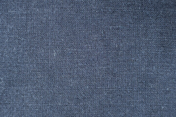 Old blue cotton and lycra fabric with signs of wear.